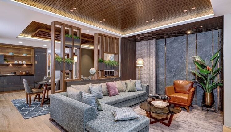 How to Choose the Right Materials for Long-Lasting Home Interiors Selecting the right materials for your home interiors can feel overwhelming; however, picking the wrong one can make you frantic. Mismatched designs, unexpected costs, and durability issues all come into play. Every home is a combination of carefully selected materials and finishes that define its character. From the warm woods to the sleek glass tabletops, materials are what define the characteristics of each room and this include stones, fabrics, wood, and metals. If you want your home to feel timeless and warm, natural materials are the way to go. Natural materials are known for their timeless appearance, uniqueness and durability. Since every area of the home serves a different purpose, Selecting the right material is important to have long-lasting interiors. For countertops, materials like quartz and granite work well. Living spaces require surfaces that are durable and stylish. By understanding the functionality of each space, we can ensure which materials need to be used and which perform well over time. Here are some of the most popular natural materials to use to enhance your home. Metal Metals fit effortlessly in contemporary style, industrial and rustic interiors. Since the material is incredibly durable and strong, it is a reliable choice. It's commonly seen in furniture frames, decor, and stair railings; they add a distinct visual appeal and contributes to the vintage-modern charm. If not properly treated, metals are prone to rust. If you are creating a bold and structured design, metal is your go-to material. Hardwood Hardwood remains the favourite in interior design. It makes spaces feel cosy and sophisticated. With proper care, hardwood lasts for generations. These are easy to clean, resist dust and exude natural beauty and timeless appeal. For home interiors, hardwood continues to be the preferred choice, as it combines lasting performance and natural beauty. It can age gracefully and hold its elegance, and is the finest material for creating interiors that stand the test of time. Engineered Wood Boards Modern home interiors rely on engineered wood boards that offer dimensional stability and long-lasting performance. MDF, HDF and premium Gurjan ply are some materials that are widely used for kitchen cabinets, TV units and built-in furniture, as they deliver consistent quality and precision. HDF, MDF and cushion materials are well suited for Indian homes due to their excellent moisture resistance. These materials are also high in durability and resistance to termites and warping. Stone Stone is synonymous with luxury. Granite is the top choice for kitchen countertops. It is heat-resistant and scratch-proof and is perfect for adding a touch of classic sophistication. Marble, on the other hand, is perfect for side tables and dining. Quartz offers high durability, elegance, and minimal maintenance. Selecting the right stone depends on the intended application and desired aesthetic. When chosen carefully, stone surfaces provide timeless appeal, making them a valuable investment for lasting interiors. Fabric Fabrics are known for their eco-friendliness and sustainability. They are widely utilised in curtains, bedding, and cushions. Cotton and linen are long-lasting, easy-to-maintain fabrics that offer a more relaxed appearance and contribute to better indoor air quality. Though they are prone to wrinkling and require occasional care, they remain the go-to choice for people seeking sustainability and comfort. Being a luxurious and cosy material, wool is found in upholstery, rugs, and soft furnishings. It adds an inviting atmosphere and is available in a range of textures. Durability is the foundation of a good home interior. With the perfect material and finishes, we can make informed decisions that are stylish and strong. When you are searching for the best interior designers in Hyderabad, it is important to have professionals by your side. D'LIFE Interiors combines premium craftsmanship, materials and factory-finished precision to deliver bespoke home interiors that are built to last. The company has a dedicated team of 1600+ employees, and over the years, D'LIFE has handed over more than 15000+ projects across India. The company also has a state-of-the-art manufacturing facility equipped with German machinery to ensure all the products are delivered on time with precision and care.